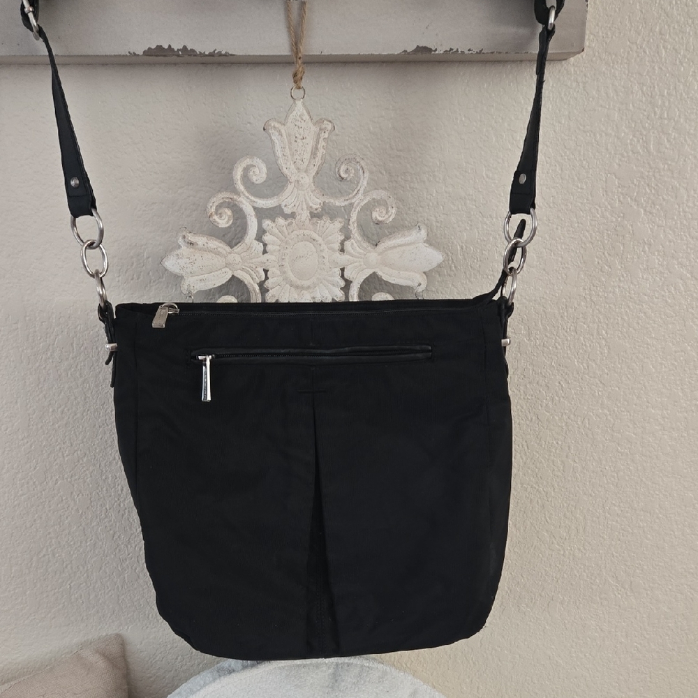 TRAVRLPRO Black Crossbody Bag